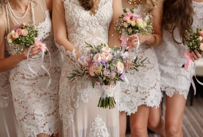 Wedding flowers, bride and bridesmaids holding their bouquets at