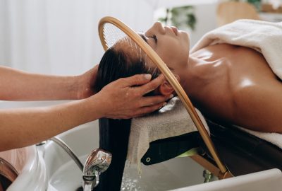 Scalp treatment spa using circulating shower water system for professional head wash therapy.