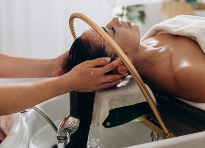Scalp treatment spa using circulating shower water system for professional head wash therapy.